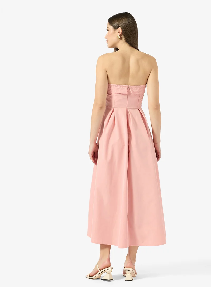 جينجر فستان بقصة أميرة بخصر منخفض وكتف مكشوف